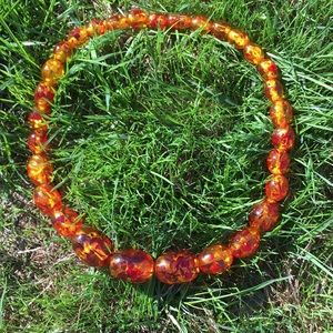 Amber necklace from Brazil. orange flame
